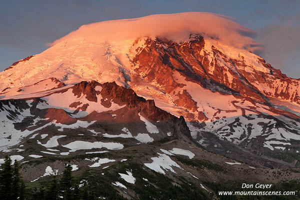 Image of Mount Rainier and cloud cap at sunrise.