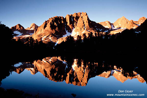 Image of Palisades reflected in Sixth Lake at Sunrise