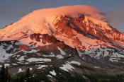 Image of Mount Rainier at sunrise with cloudcap