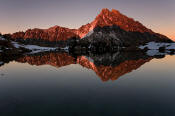 Image of Mount Stuart reflected in Ingalls Lake at sunset