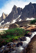 Image of Warrior Peak above waterfall in Cirque of the Towers, Wind Rivers